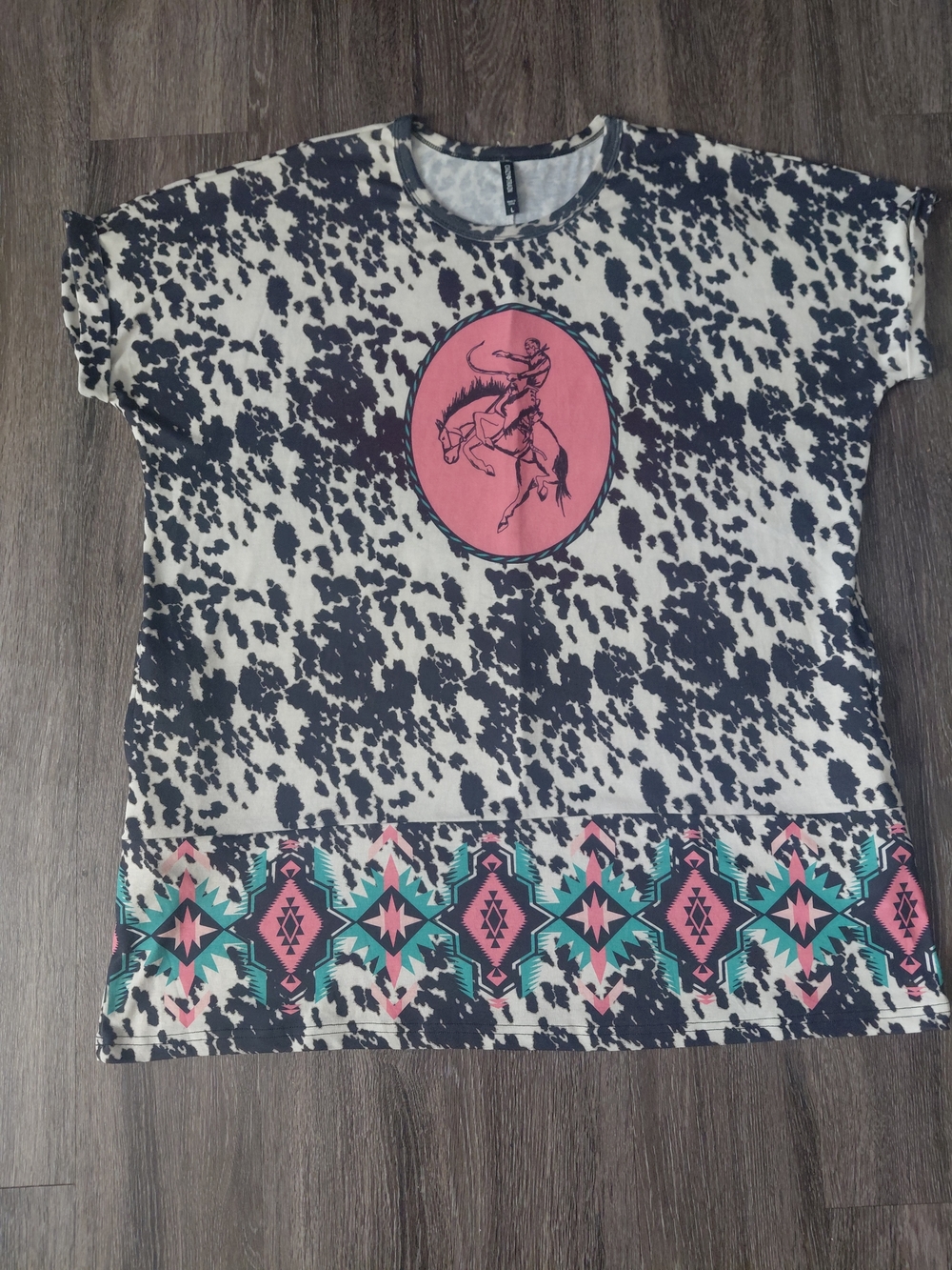 Black & White Cowprint Top with Pink Rodeo Graphic